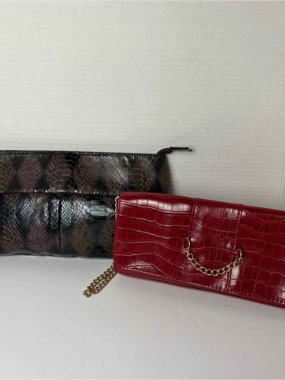 2-items NWOT- 1 snake skin harlequin diamond style pattern purple & blk clutch